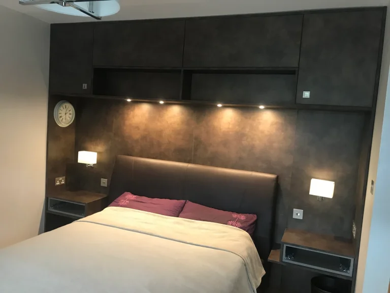 bespoke bedroom furniture with lamps on the sides