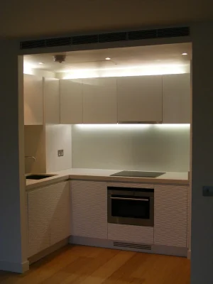 kitchen with narrowed entrance with bespoke cabinets