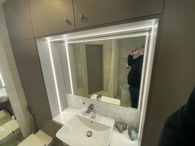 sink with led-lit mirror