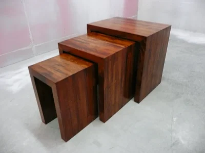 three small pieces of brown furniture